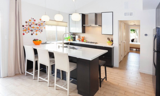 Uptown Design District Condo | Designer Condo With Wrap Around Patio Located in the Famous Movie Colony