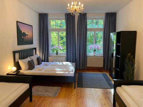 Gehlsdorf Apartment | DEUTSCHE VILLA - SUPERIOR APARTMENT- 1 Obergeschoss mit gem Sauna und Garten