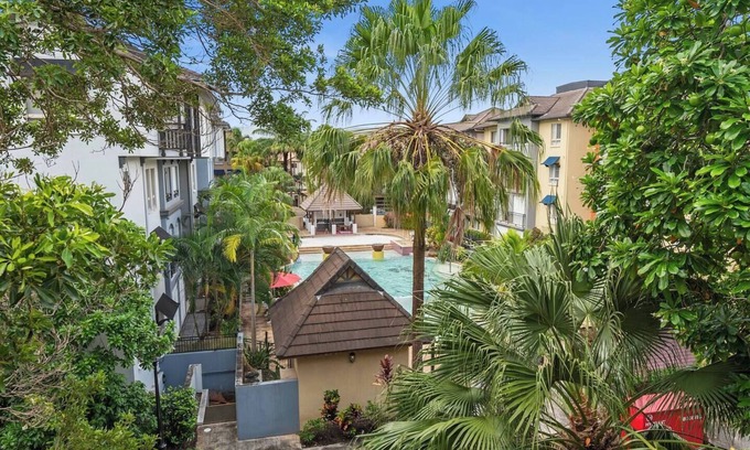 Cairns North Apartment | Discover a Lush Poolside Stay at The Lakes Resort