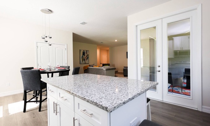 Palm Bay House | Discover Palm Bay by staying at this picturesque four-bed, three-bath home.