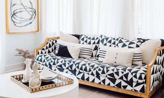 Midtown Apartment | Discover Ponce Hideaway—an elegant 2BR, 2.5BA retreat in Midtown Atlanta. Modern-eclectic design, gold accents, and jewel tones set the scene. Enjoy a private patio, full kitchen, washer/dryer, & walkable access to Ponce City Market and Piedmont Park