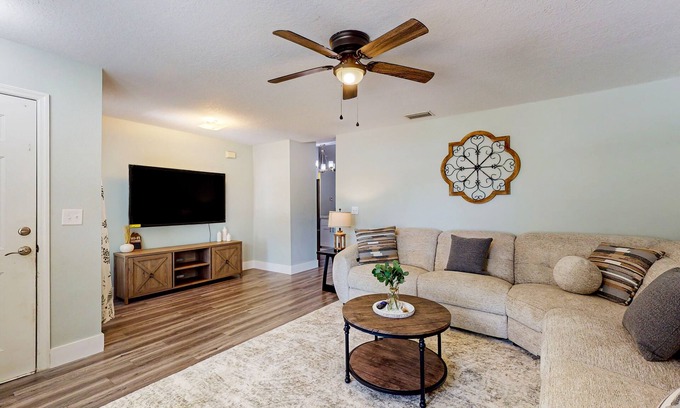 Palmetto House | Dog-friendly home with a private pool, home theater, sunroom, & washer/dryer