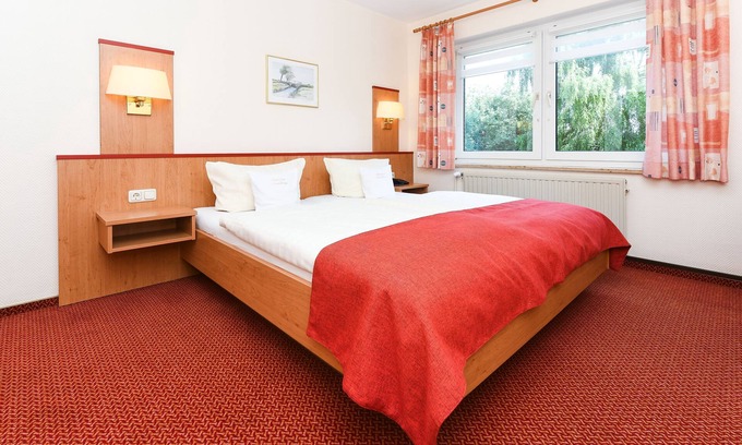 Esens Cottage | Doppelzimmer Juist - Pension Nordkap in Bensersiel