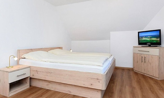 Neuharlingersiel Cottage | Doppelzimmer mit Balkon Oder Terrasse - Doppelzimmer in der Hotel-pension Marlies