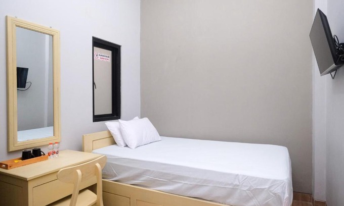 Banjarsari Hotel | DR Living Syariah Solo Mitra RedDoorz