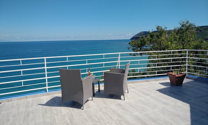 Deshaies Villa | Dream stay! Large villa with swimming pool, above the beach, sea view.