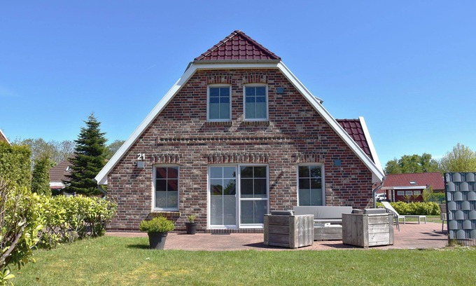 Neßmersiel House | Dream vacation home NordseeStar with fireplace and lounge in Neßmersiel