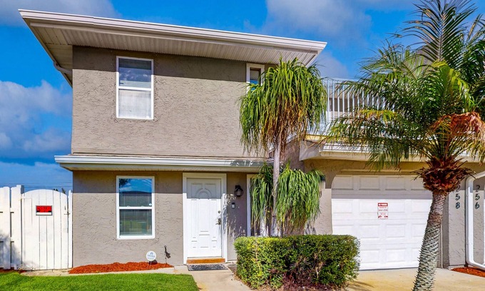Indialantic House | Dreamy duplex with dog-friendly fenced yard, private outdoor living, AC, & W/D