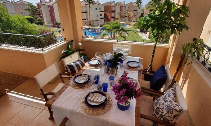 Caserio Los Tarquinos Apartment | Duplex overlooking pools and mountains in Altaona Golf