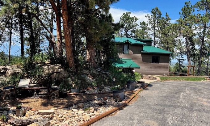 Sturgis House | Eclectic Rally retreat in the woods just minutes from legendary Main Street.