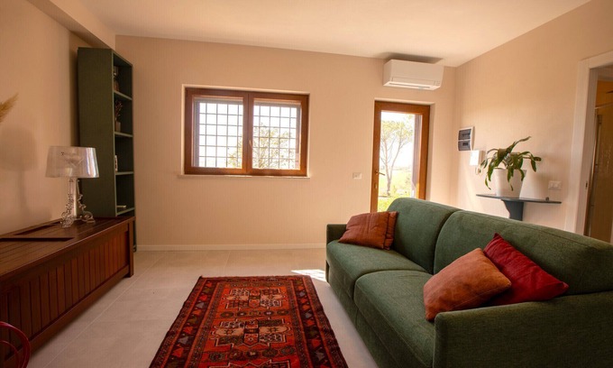 Belvedere Ostrense Apartment | Elegant new house with garden, veranda and shared pool