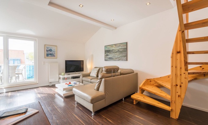 Juliusruh Apartment | Elegant vacation apartment with south-facing balcony, 100 m to the beach