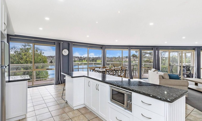 Warrnambool House | Elevated waterfront home, featuring both river and ocean views.