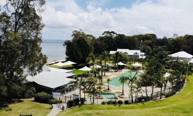 Cams Wharf Villa | Elysian Escape - 4 Pools, Lakeside, Raffertys Resort