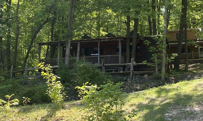 Trumansburg Cabin | Enjoy lake views as you relax on the porch!