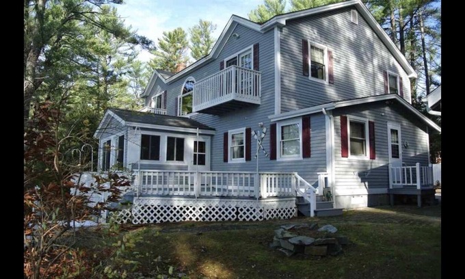 Gilmanton IW House | Enjoy lakefront life. Sleeps 12+. Gorgeous sunsets year-round on Crystal Lake