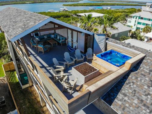 Bethune Beach House | Enjoy the Best Time of the Year in Florida at Redfish Dance ~ Riverfront Pool Home with Dock - 6958T