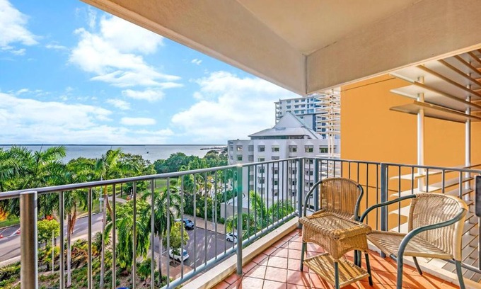 Darwin City Centre Apartment | Esplanade Poolside Living with Lush Balcony Vistas