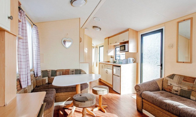 Caister-on-Sea House | Experience comfort and relaxation in our charming caravan, perfect for your next getaway.