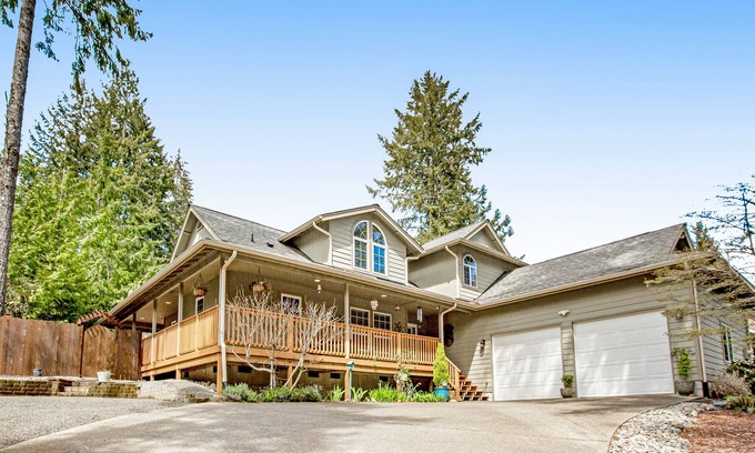 Allyn House | Fairway-view home with deck, grill, central AC, game room, Ping-Pong, & WiFi