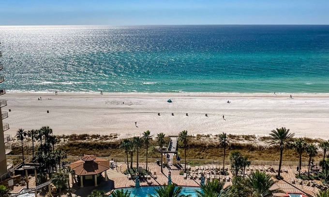 Upper Grand Lagoon Condo | FALL BREAK DEALS PLUS GULF VIEWS, BEACH CHAIR SERVICE AND PREMIER PARKING!