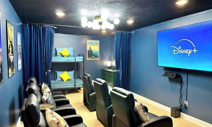 Greensboro House | Family Movie and Game Room 2 King 5 Queen and 2 Twin Beds