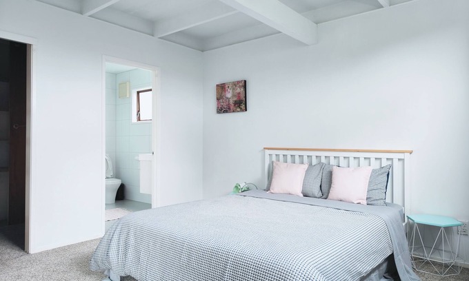 Glenfield House | Family room with door lock and self bathroom with bush view