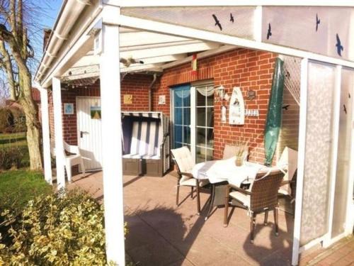 Neßmersiel House | Ferienhaus Huus Wattenmeer in Nessmersiel mit Garten, Terrasse, Sauna, Räder, und Grill