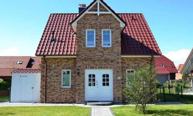 Schonberger Strand House | Ferienhaus Kapitänshaus Niclas mit Sauna, Badewanne, Kamin und Wlan