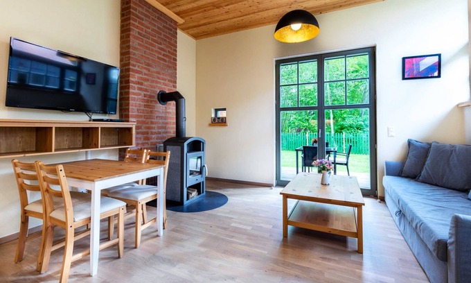 Steffenshagen Apartment | Ferienwohnung Sonne mit Terrasse, Kamin und Garten - Ferienhaus Sonne, Mond und Sterne bei