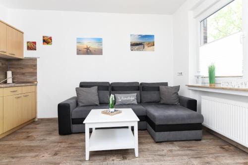 Neuharlingersiel Apartment | Ferienwohnungen Haus Boje "Wattwurm"