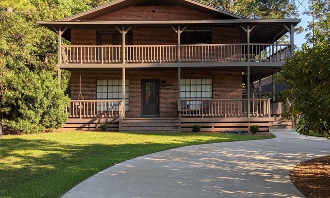 Brookeland House | Fishers Foxhole - two story home with wrap around deck and lake access.