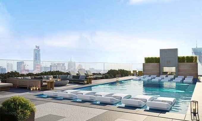 Rainey Street Historic District Condo | Floor 22 King, Rooftop Pool, Free Cabanas, Dogs OK