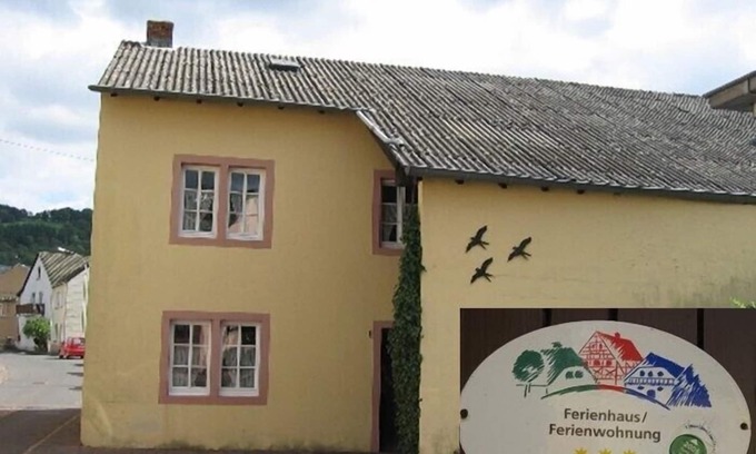 Waxweiler House | Former farm with a rebuilt barn and courtyard