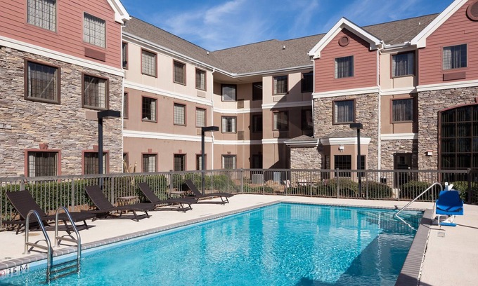 Tougaloo Condo | Free Breakfast. Outdoor Pool. Gym. Near IBM & Northpark Mall.
