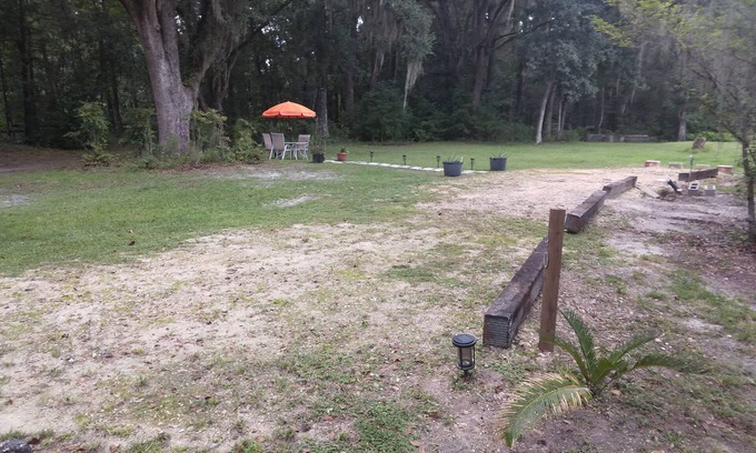 Alachua RV Rental | Full hook up RV Trailer site on private 1 acre Conveniently located