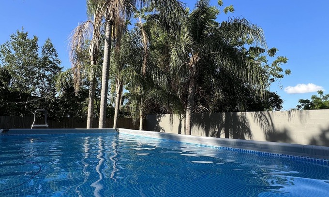 Palm Harbor House | Fully equipped: Salt Pool, Xbox, TV in every room & patio