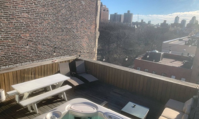 East Village Apartment | Fully stocked oasis with private outdoor space, BBQ, hot tub, surround sound