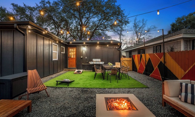 South Main House | Fun-Filled Backyard:Firepit-Grill-Games-Good Vibes