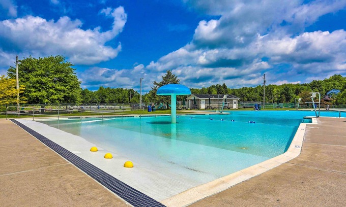 Pocono Lake Cottage | Game Room & Fire Pit: Tree-lined Pocono Lake Cabin
