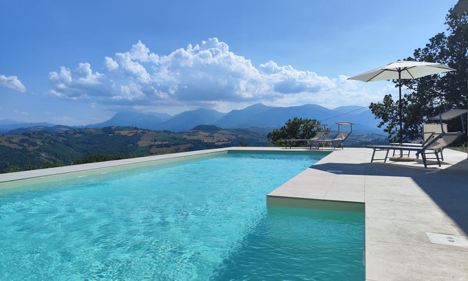 Penna San Giovanni House | GrazieSole Farmhouse whole house exclusively, facing the Sibillini Mountains