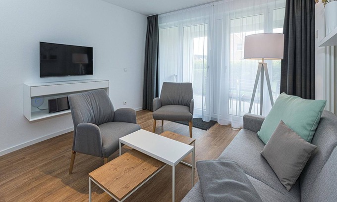 Bensersiel Apartment | Great apartment, close to the beach, with terrace, parking, use of swimming pool & sauna