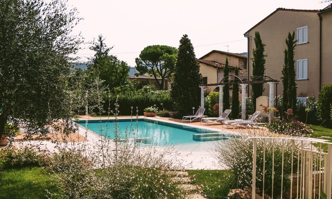 San Donato House | Ground floor villa apartment with garden and pool, 1 km from the city