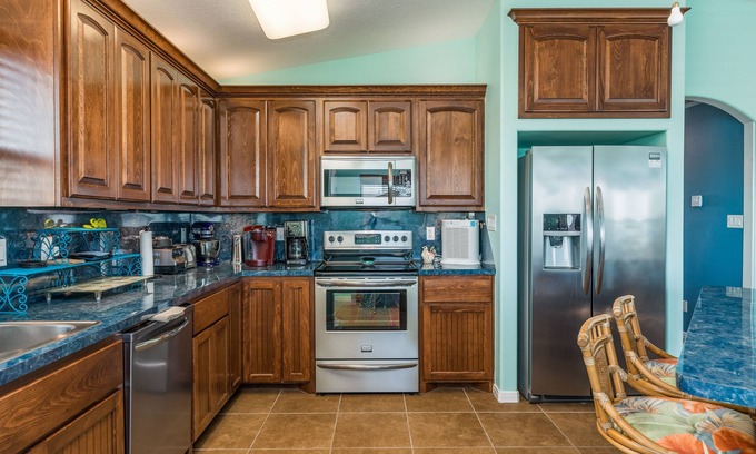 Crystal Beach Cottage | Gulf-view Home with wraparound deck - one block to the beach