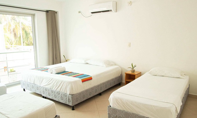 Covenas Hotel | Habitación Superior Familiar Con Balcón Cerca A La Playa