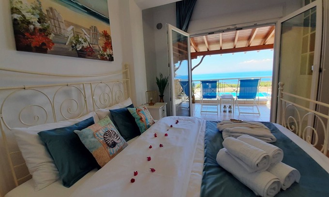 Nea Propontida Villa | Halkidiki Blue Pastel, a cliff villa with wide sea view, and large shared pool