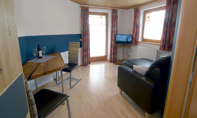 Hopfen am See Condo | Haus Vöhringer - Modern vacation apartment in a top location directly on Lake Hopfensee in the Allgäu