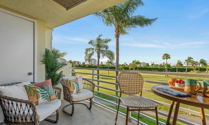 Isla del Sol Condo | Heated Pool + Hot Tub + Beach Gear + Golf Course Views. 5 Min to St. Pete Beach