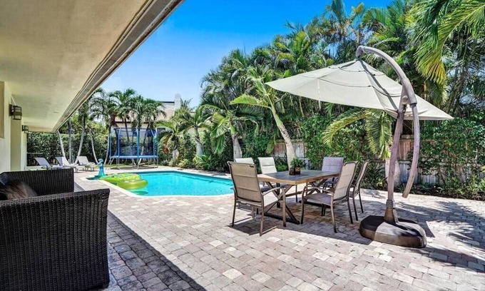 Oakland Park Villa | Heated Pool Tropical Oasis Water Slide