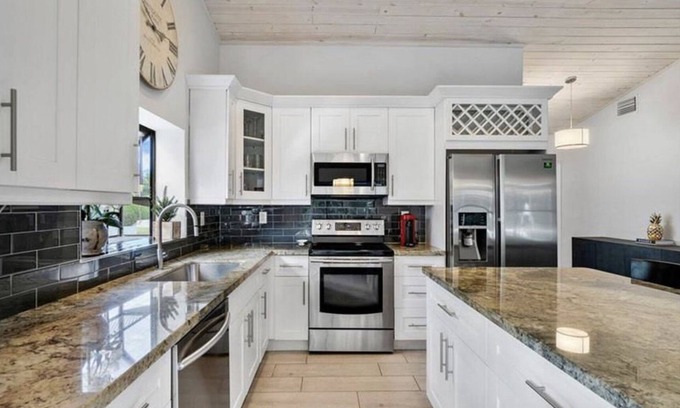Lake Ida Shores House | Heated Saltwater Pool! Beautiful Activity Filled Three BR Home Downtown Delray